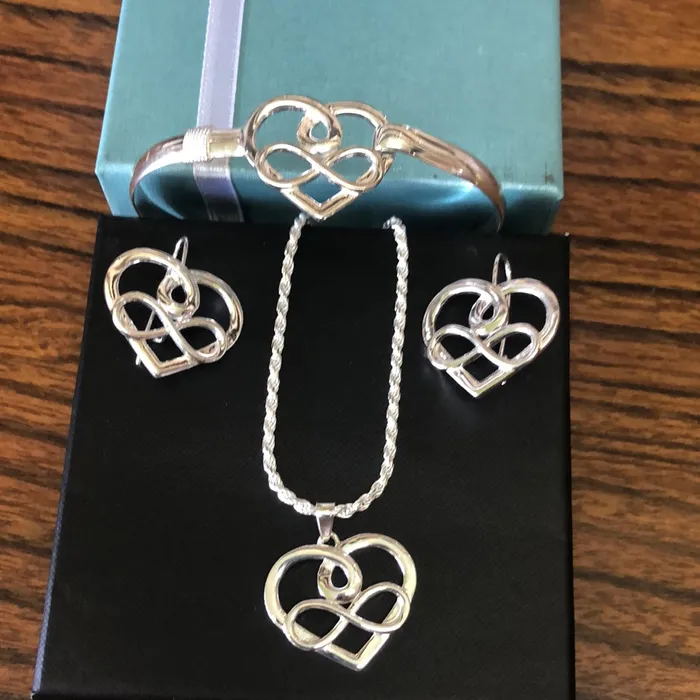 Johnny jeweler stcroix Sterling silver heartinfinity set Rings