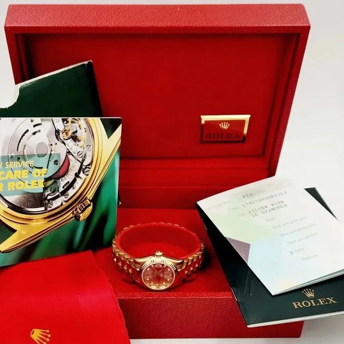 Ladies Rolex 26mm Presidential 18K Yellow Gold Watch with Silver Diamond Dial and Fluted Bezel PreOwned Rolex PreStyled Sets
