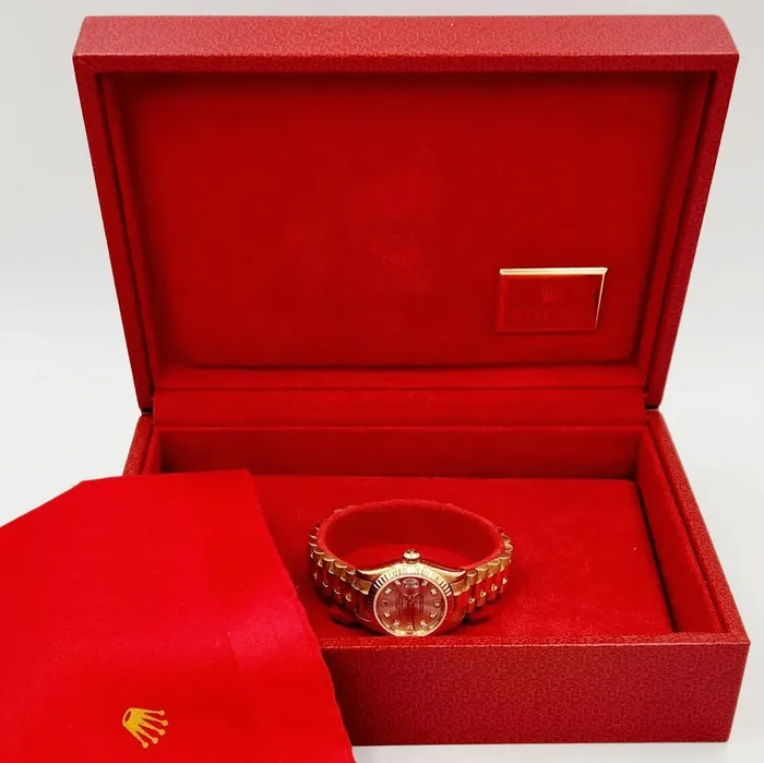 Ladies Rolex 26mm Presidential 18K Yellow Gold Watch with Silver Diamond Dial and Fluted Bezel PreOwned Rolex PreStyled Sets