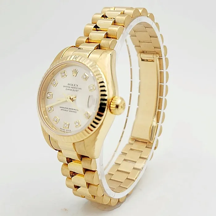 Ladies Rolex 26mm Presidential 18K Yellow Gold Watch with Silver Diamond Dial and Fluted Bezel PreOwned Rolex PreStyled Sets