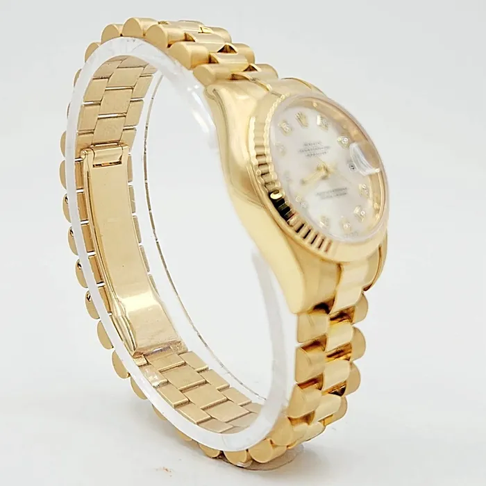 Ladies Rolex 26mm Presidential 18K Yellow Gold Watch with Silver Diamond Dial and Fluted Bezel PreOwned Rolex PreStyled Sets