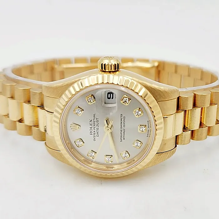 Ladies Rolex 26mm Presidential 18K Yellow Gold Watch with Silver Diamond Dial and Fluted Bezel PreOwned Rolex PreStyled Sets