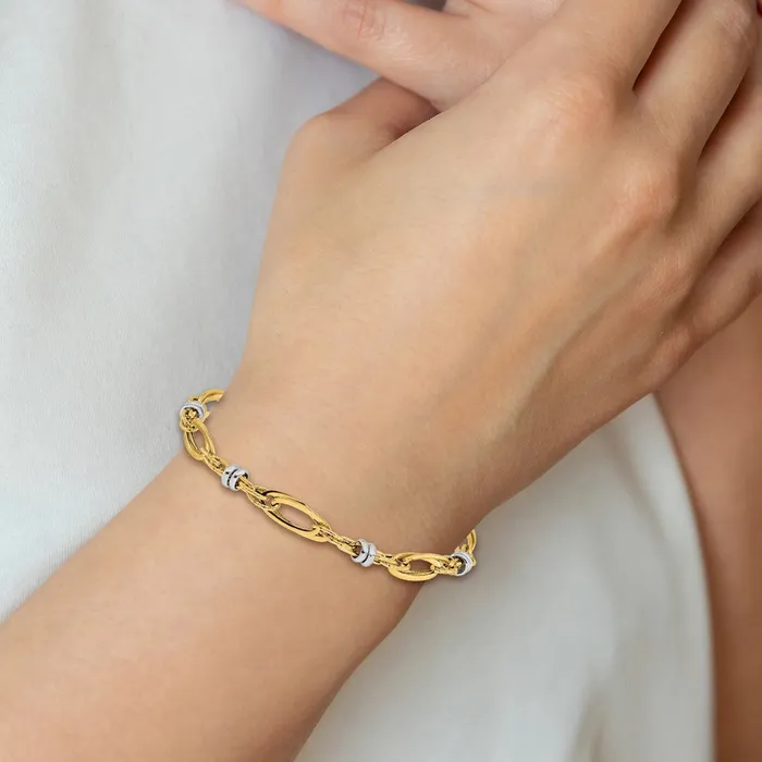 Qgold Bracelets 14k Twotone 56 mm Polished and Textured Fancy Link Bracelet 303 grams Qgold Bracelets 14k Twotone 56 mm Polished and Textured Fancy Link Bracelet 303 grams