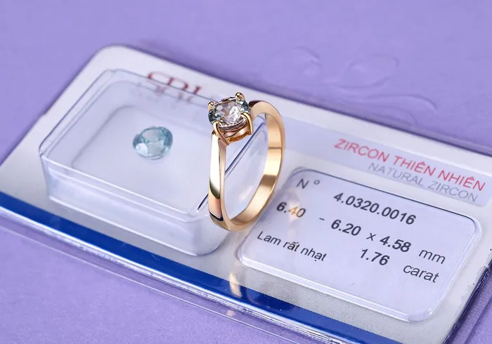 Rings AME Jewellery Blue Zircon Twist Ring in 14K Yellow Gold